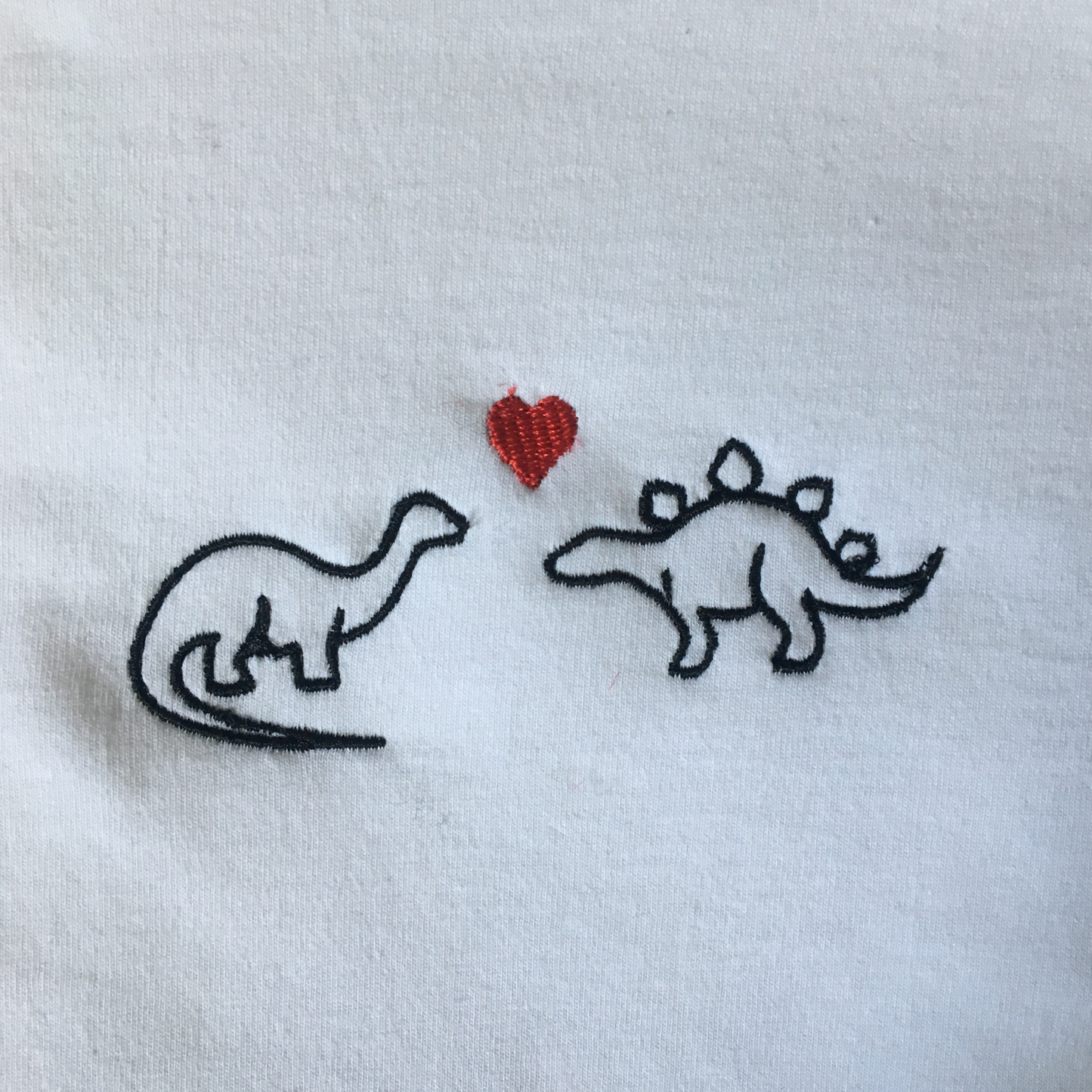 'Dinosaurs in love' embroidered tee